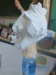 Tête en papier mâché