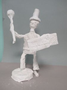 Petit personnage modelé en plâtre