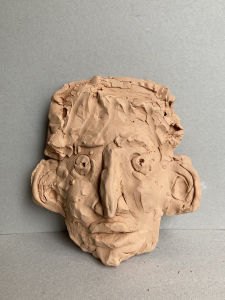 Tête d'enfant en terre cuite