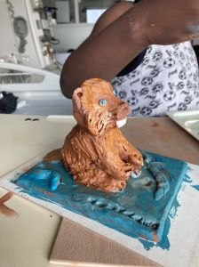 Figurine en argile peinte à la gouache