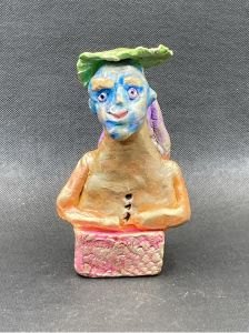 Personnage au visage bleu