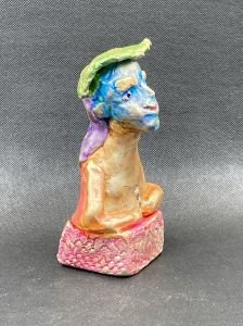 Homme au visage bleu de profil