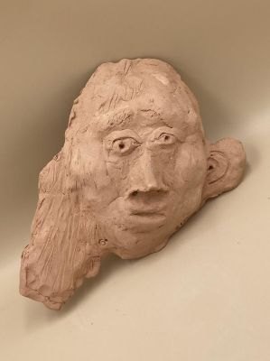 Masque en terre cuite